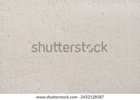 Canvas texture background light beige sepia of cotton burlap natural fabric, cloth for wallpaper and design backdrop. Close up white cloth texture background. Top view.