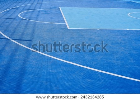 Rubber blue basketball cover with white markings