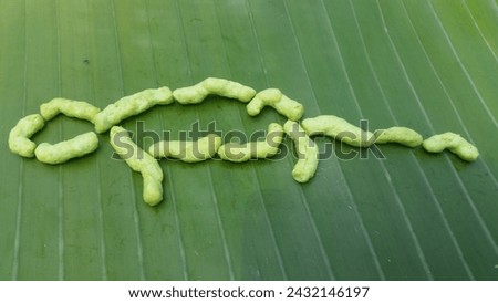 this is a picture of snacks on a leaf