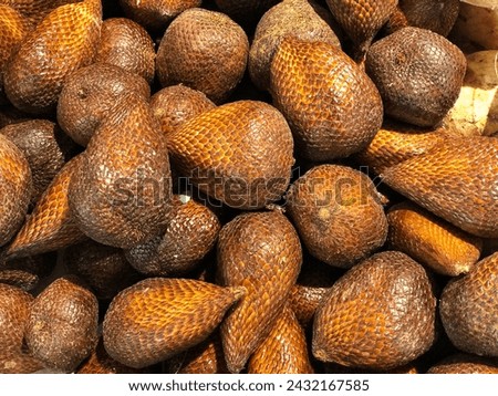 Fresh Salak Fruit (Salacca zalacca), Salak fruit is snake fruit. Tastes very good with a slight rough skin texture. displayed in supermarkets or traditional markets for sale