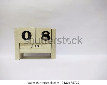 08 june wooden calendar in white background