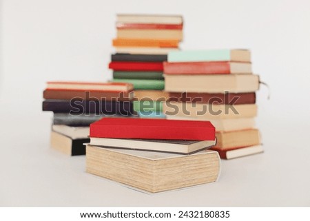 pile of books on white  background, copy space