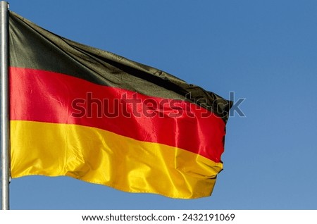flag of Germany on a blue sky background
