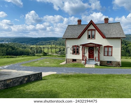South Fork, Pennsylvania: Johnstown Flood National Memorial. Site of former Lake Conemaugh and South Fork Dam, which broke and caused the 1889 disaster. Unger farmhouse witnessed the dam break. Royalty-Free Stock Photo #2432194475
