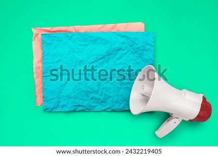 Loudhailer or megaphone with speech bubble and empty copy space template. Announcement, advertising, public hearing concept. Mockup design with loudspeaker, background with blank space Royalty-Free Stock Photo #2432219405
