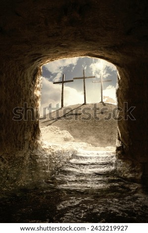 Three wooden crosses on a hill in the morning. Concept of Crucifixion on Mount Golgotha, resurrection of Jesus Christ. Christian Easter holiday symbol, Calvary. Blurred background, blur scene