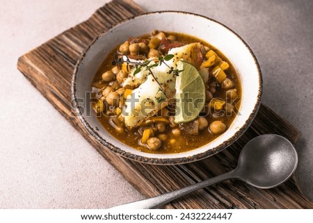 Potaje de vigilia - Chickpea stew with spinach and cod. Typical spanish food for Easter holidays. Chickpea stew with spinach