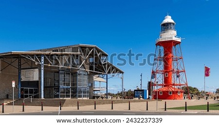 Port Adelaide lighthouse with Fishermen's Wharf Market Royalty-Free Stock Photo #2432237339