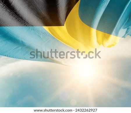 The Bahamas waving flag in beautiful sunlight.