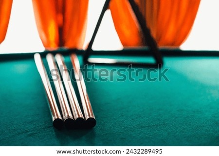 Billiard cues. Billiard table with cues. Billiards room.