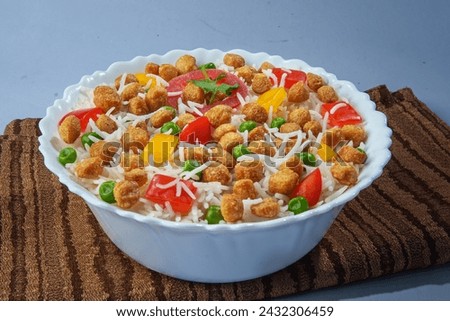 A Bowl of Soya Mini Chunks Fried Rice on Table Cloth Royalty-Free Stock Photo #2432306459