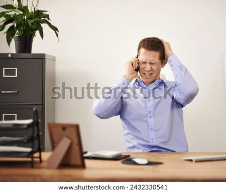Stress, phone call and businessman at desk with anger, bankruptcy and notification of unemployment. Anxiety, depression and burnout with smartphone, frustrated man in office and termination notice. Royalty-Free Stock Photo #2432330541