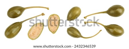 Capers isolated on white background. Pickled or canned capers. Top view. Flat lay Royalty-Free Stock Photo #2432346539