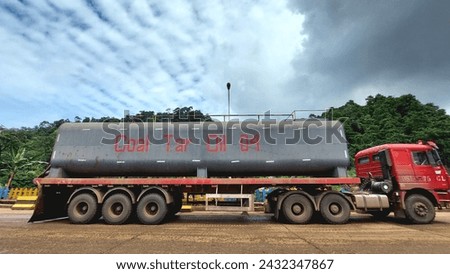 truck tanker industri 
truck haul 
truck trailer 
coal tar oil
red truck Royalty-Free Stock Photo #2432347867