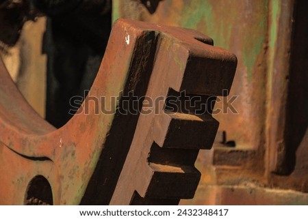 Close up of the large gears on an oil pump jack.