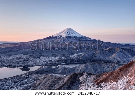 Mt. Fuji with snow cap in winter. Royalty-Free Stock Photo #2432348717