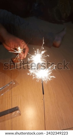 Raw photo of beautiful lit fireworks show on dark background for digital background and art