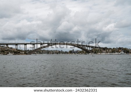 Gladsville bridge in Sydney with with small harbors and boats.