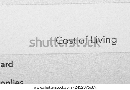 Cost of living refers to the amount of money that is required to maintain a certain standard of living in a particular geographic area Royalty-Free Stock Photo #2432375689