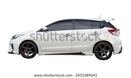 Side view of white hatchback car is isolated on white background with clipping path.