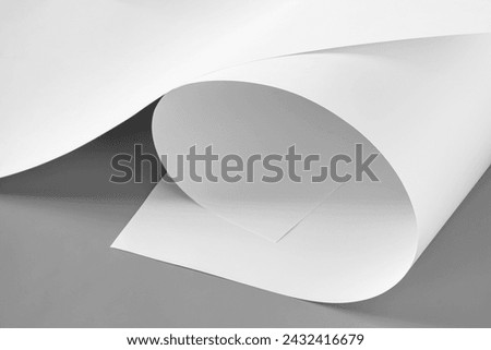 White sheets of paper. Black and white image.