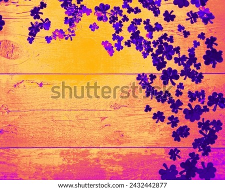 The image is of a wall adorned with purple flowers, adding a colorful and vibrant touch to the surroundings.