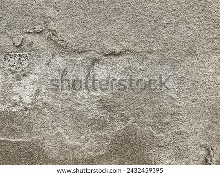 Old cement wall with peeling paint. Abstract background Old concrete wall with cracks and scratches. Great background or texture and texture for design