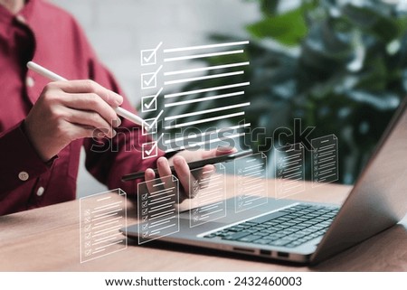 Online document management and smart checklist, Business Women take the questionnaire on their smartphone, E document, Performance checklist, Take an assessment, questionnaire, evaluation, example Royalty-Free Stock Photo #2432460003
