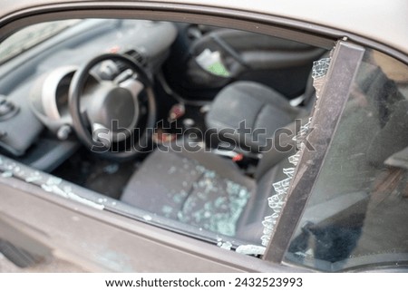 Delinquency, Vehicle Theft - Broken Window	 Royalty-Free Stock Photo #2432523993