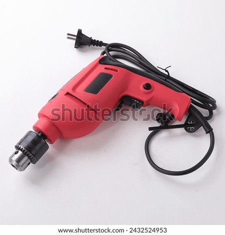 Electric tools power drill machines and white background, Electric drill tools set,  Picture of a green jig sawand a drill on a wooden background