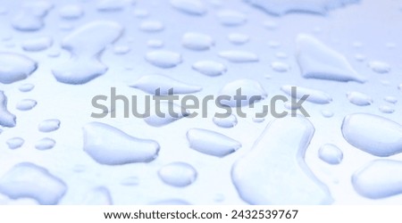 Closeup, water and droplets on metal surface, winter and rain in cold season. Hydration, natural splash of clean sustainability from weather, refreshing and clear liquid for texture, refresh and wash