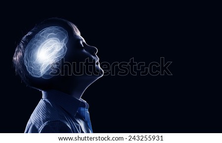 Young thoughtful boy of school age with closed eyes