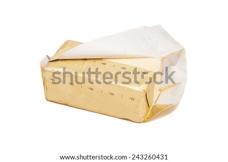 Tasty butter isolated on white  Royalty-Free Stock Photo #243260431