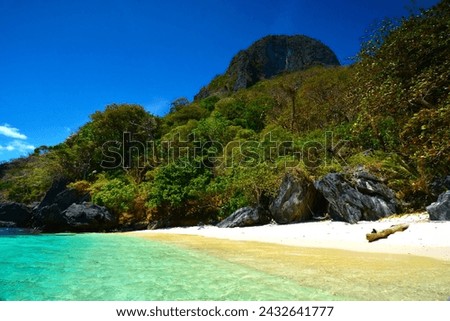 Tropical paradise - sunny day on a sandy beach (El Nido, Palawan, Philippines) Royalty-Free Stock Photo #2432641777