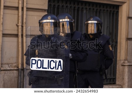A group of spanish riot policement from Policia Nacional, during the catalan independist riots of 2019 Royalty-Free Stock Photo #2432654983