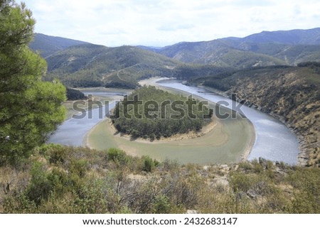 The Meandro del Melero is a natural area of extreme beauty, in a particular enclave that separates Las Hurdes from the province of Salamanca. Royalty-Free Stock Photo #2432683147