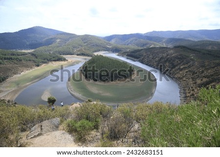 The Meandro del Melero is a natural area of extreme beauty, in a particular enclave that separates Las Hurdes from the province of Salamanca. Royalty-Free Stock Photo #2432683151