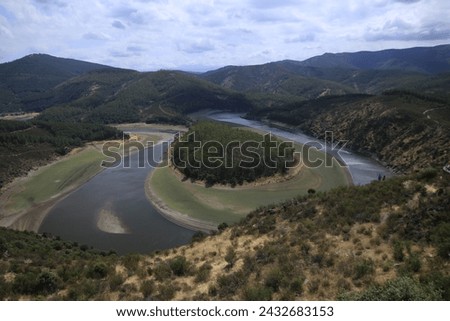 The Meandro del Melero is a natural area of extreme beauty, in a particular enclave that separates Las Hurdes from the province of Salamanca. Royalty-Free Stock Photo #2432683153