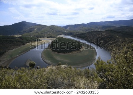 The Meandro del Melero is a natural area of extreme beauty, in a particular enclave that separates Las Hurdes from the province of Salamanca. Royalty-Free Stock Photo #2432683155