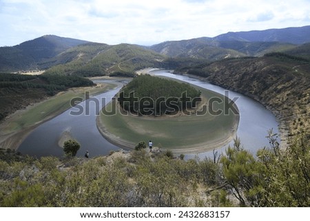 The Meandro del Melero is a natural area of extreme beauty, in a particular enclave that separates Las Hurdes from the province of Salamanca. Royalty-Free Stock Photo #2432683157