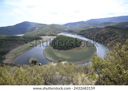 The Meandro del Melero is a natural area of extreme beauty, in a particular enclave that separates Las Hurdes from the province of Salamanca. Royalty-Free Stock Photo #2432683159