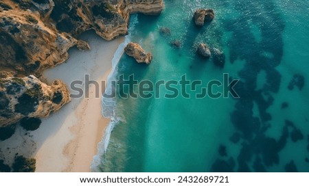 A drone shot of algarve coast in portugal Picturesque Algarve Beach Panorama, Panoramic view of a stunning Algarve beach with golden cliffs and turquoise waters Royalty-Free Stock Photo #2432689721