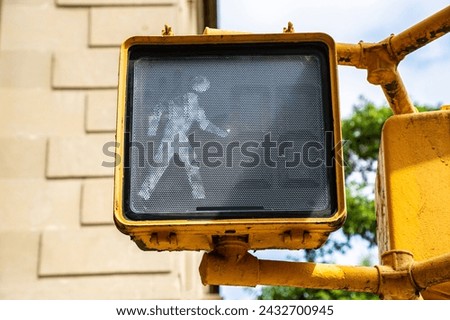 White "Walk sign" pedestrian traffic light in New York City, NY, USA