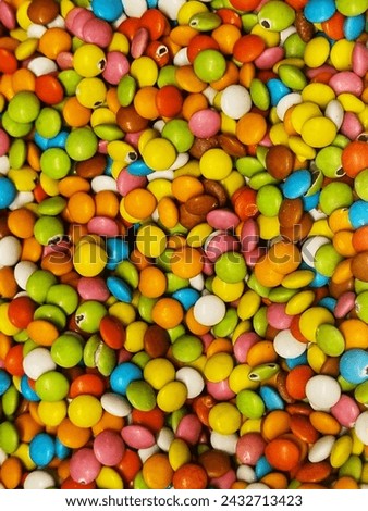 Colorful bonbons: Small, sugary candies typically coming in various colors and flavors, popular among children and candy enthusiasts. Royalty-Free Stock Photo #2432713423