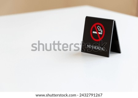 A sign indicating that this is a non-smoking seat