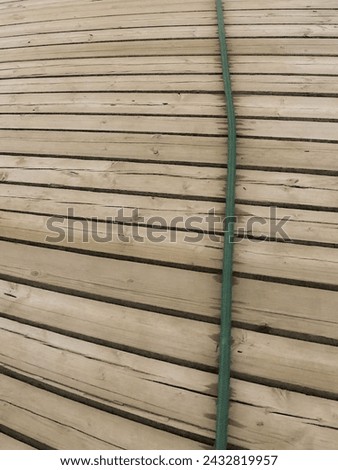 Wooden timber bridge with rope 