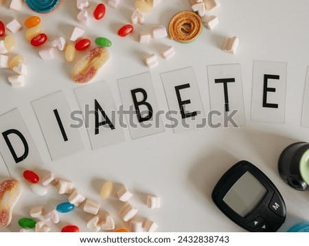 Diabetes word written on a white background with tablets.