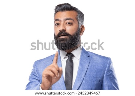 Young business man with beard, Showing index finger for warning or reminding something important