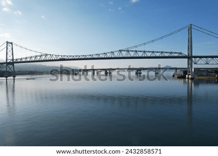 The Hercilio Luz Bridge, in Florianopolis, Brazil. Royalty-Free Stock Photo #2432858571