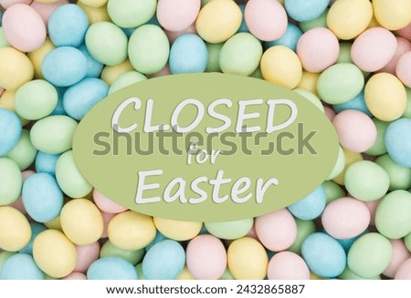 Closed for Eater sign with pale Easter eggs candy Royalty-Free Stock Photo #2432865887
